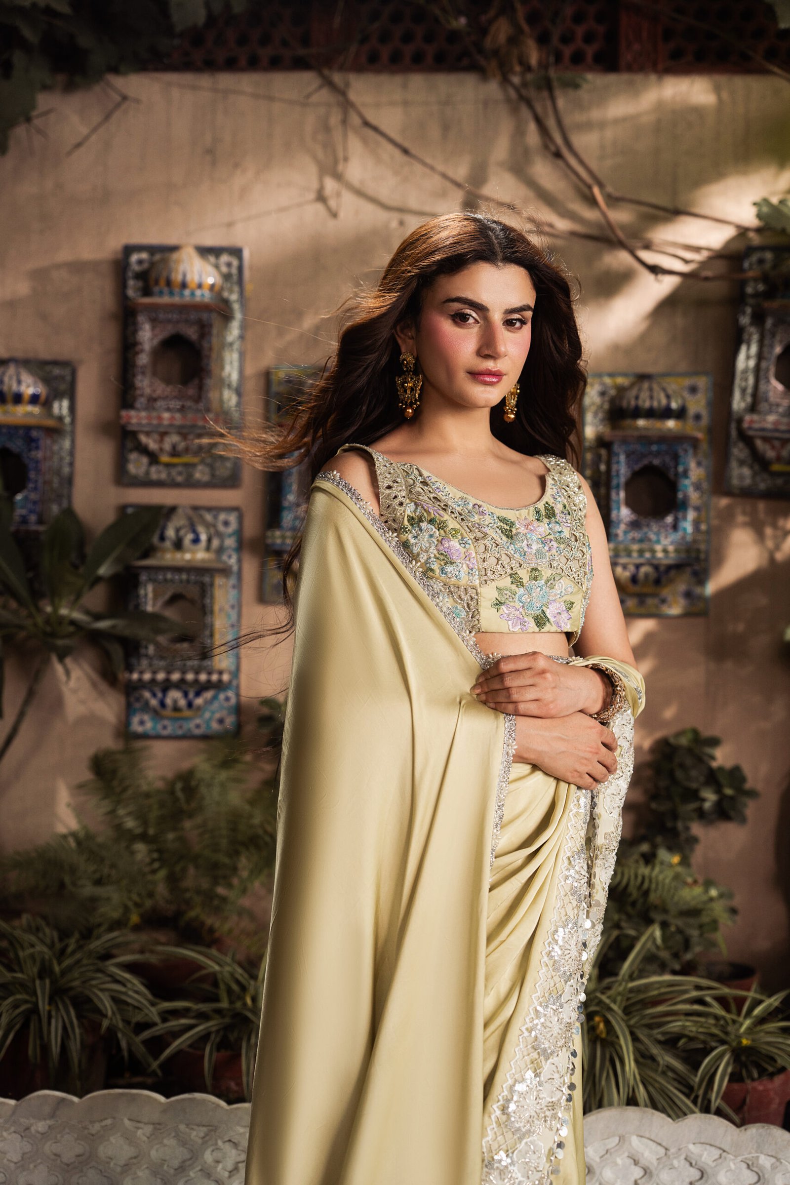 Marigold Luxury Silk Saree by Gulab Official Model wearing Marigold luxury pure Shamooz silk saree with embroidered blouse and handcrafted embellishments.