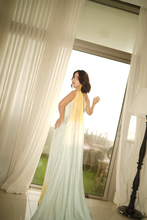 Elora back view with flowing ombré silk